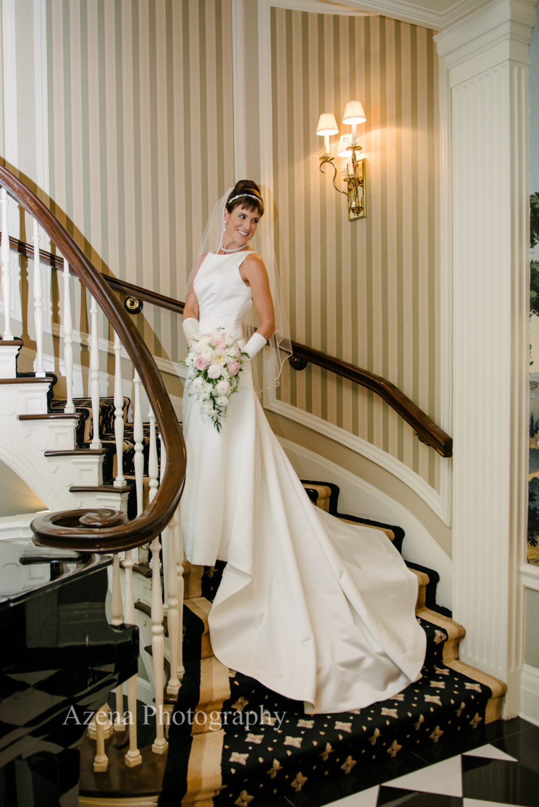 bride on staircase at the Madison Club