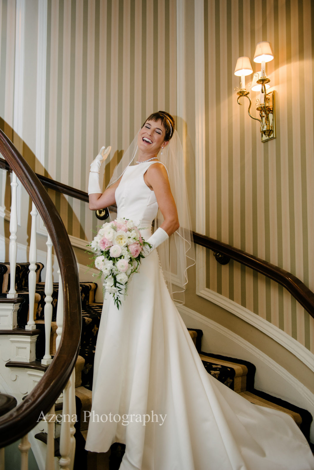 bride on staircase at the Madison Club