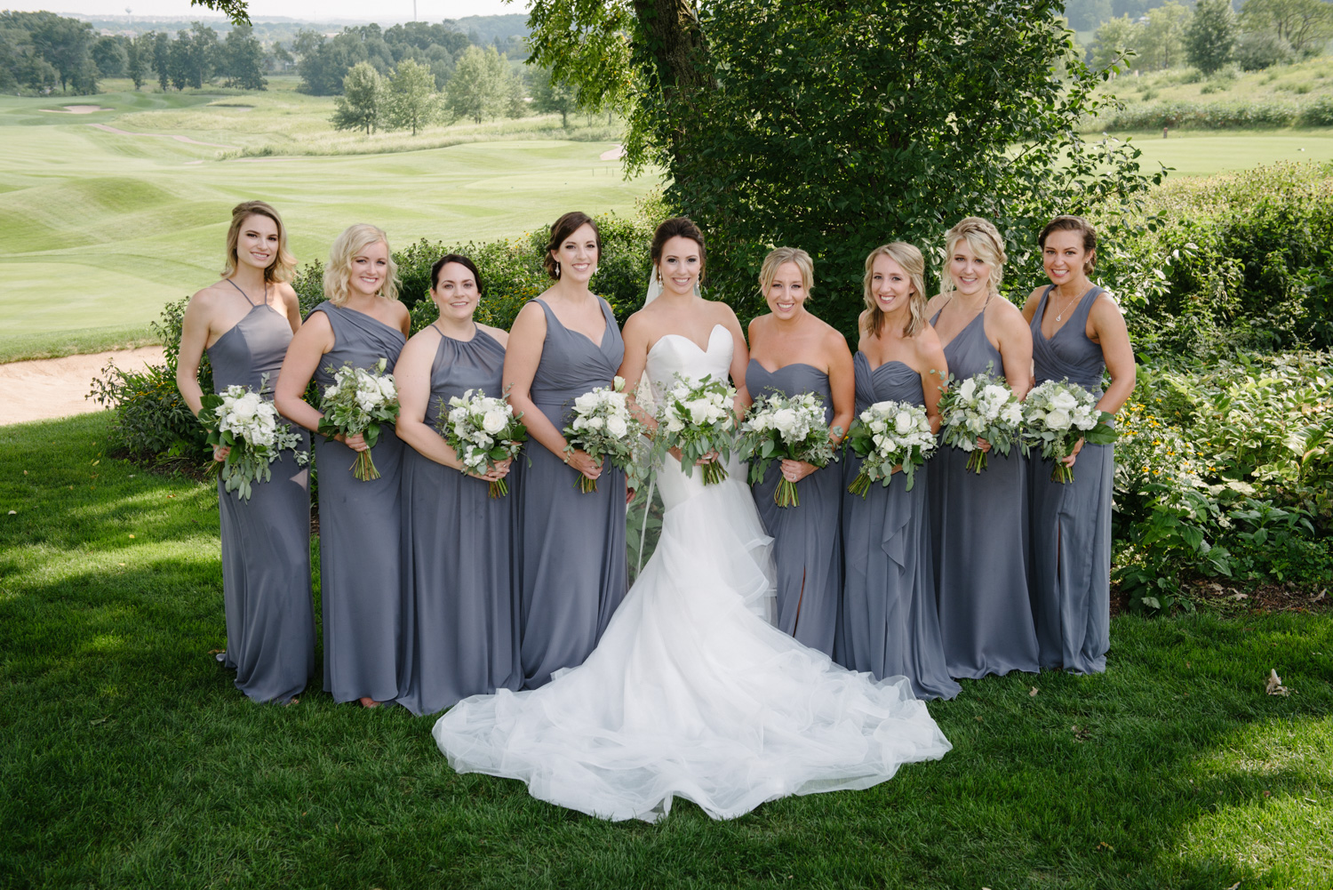 Gray Bridesmaid dresses White and green bouquets