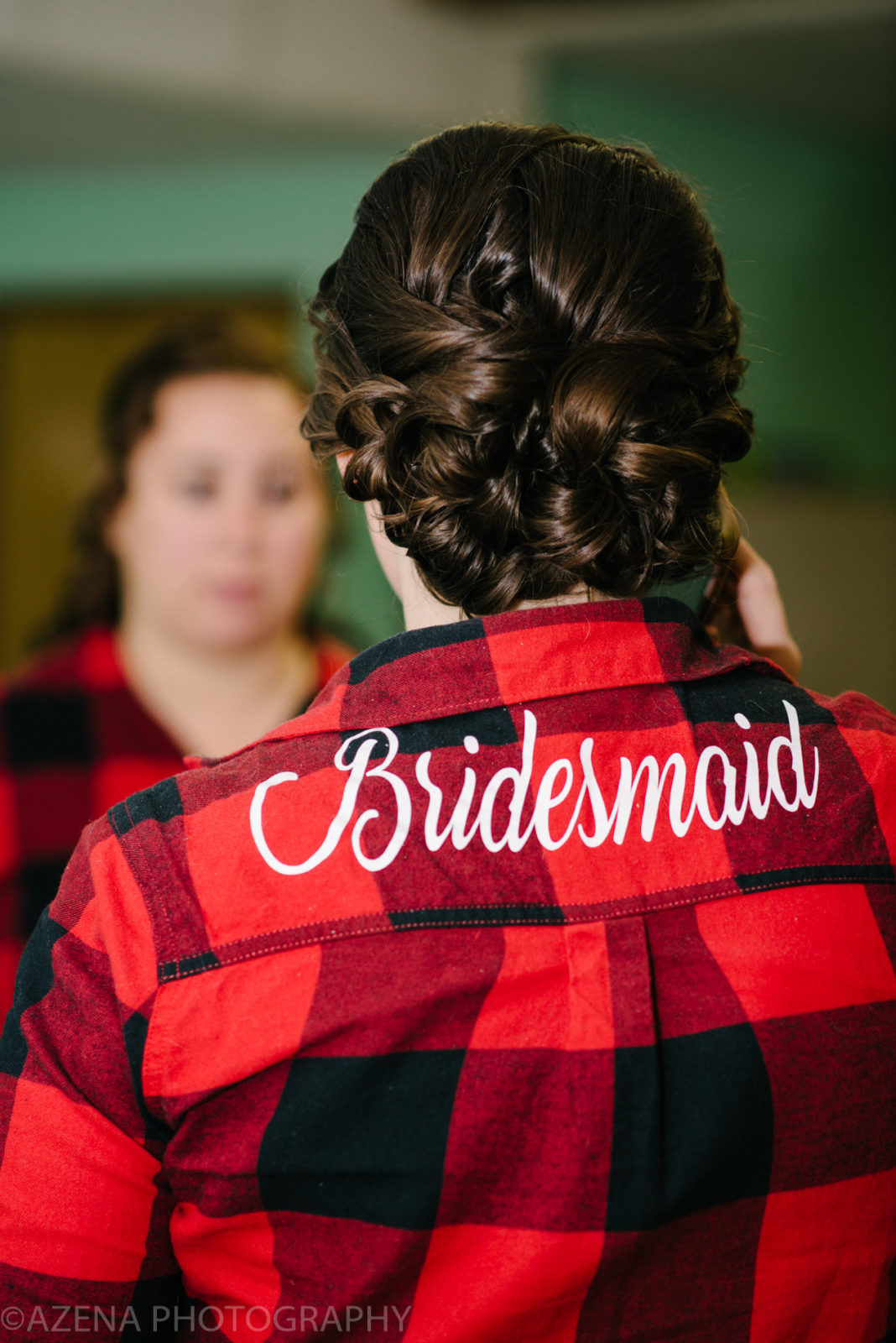 bridesmaid written on red flannel shirt