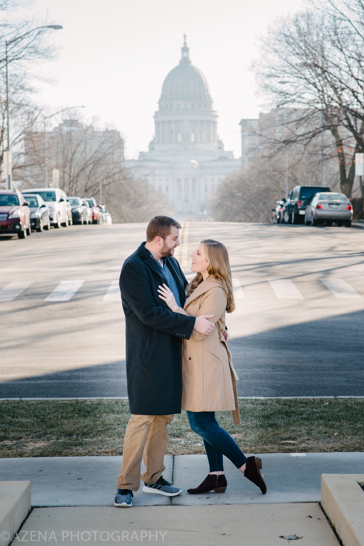 Winter engagement session at the Edgewater in front of the Capitol in Madison, WI