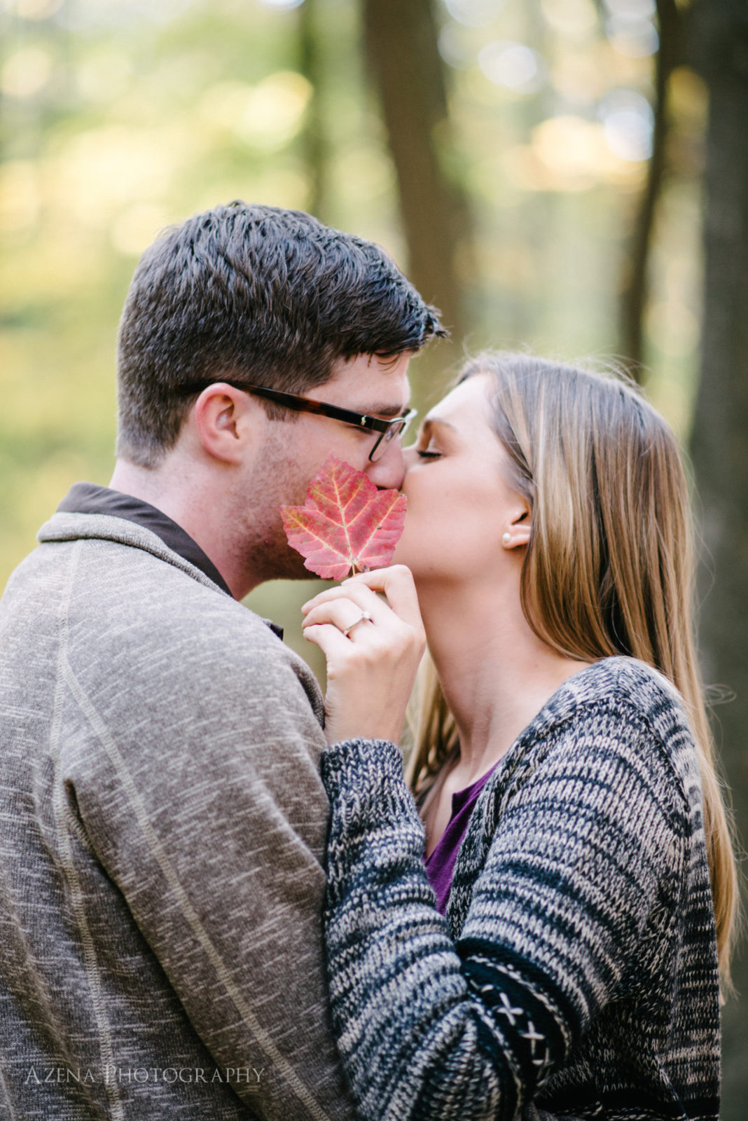 red leaf kiss. fall engagement session at devil's lake state park