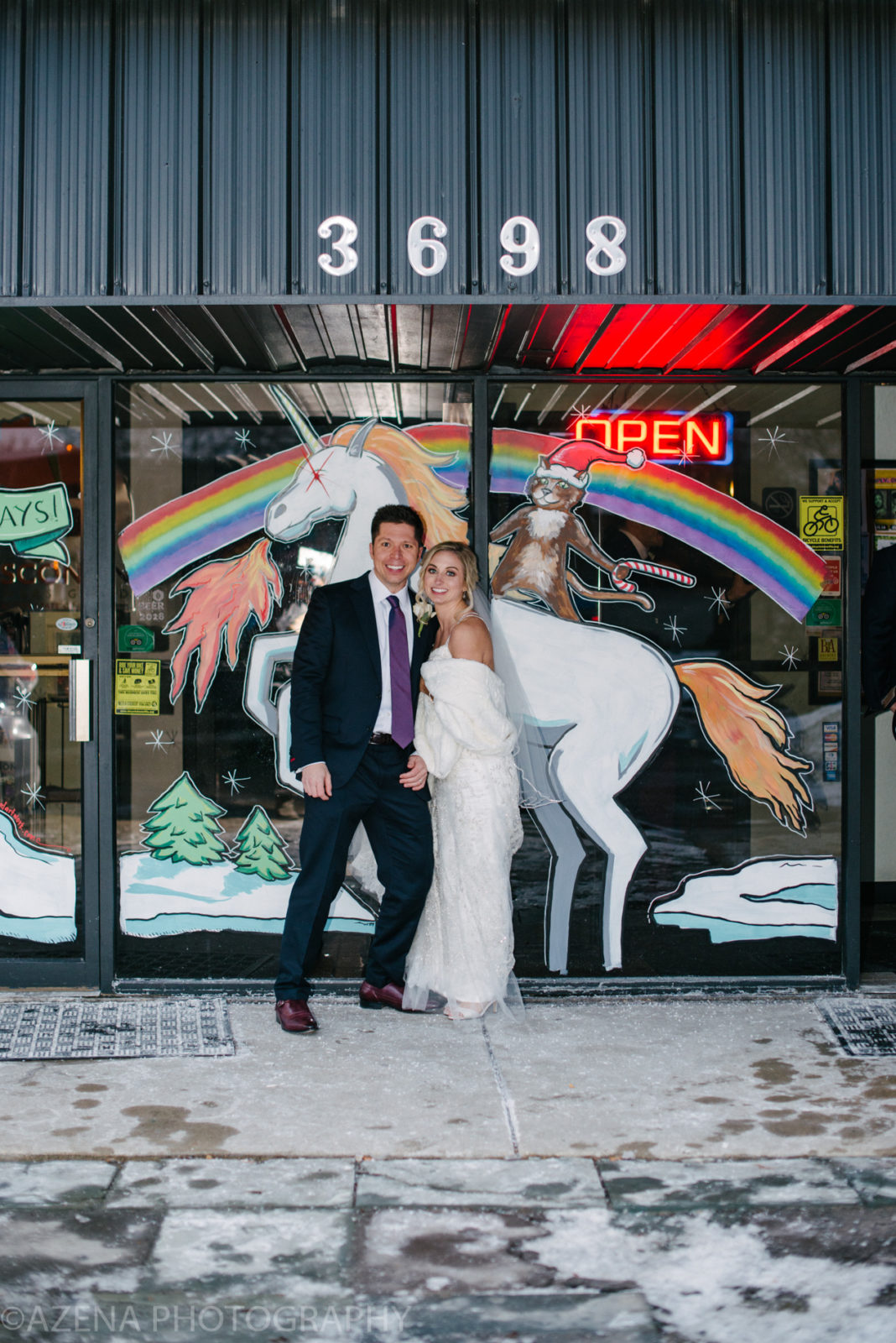 Bride and Groom in front of unicorn at Karben 4 Brewing
