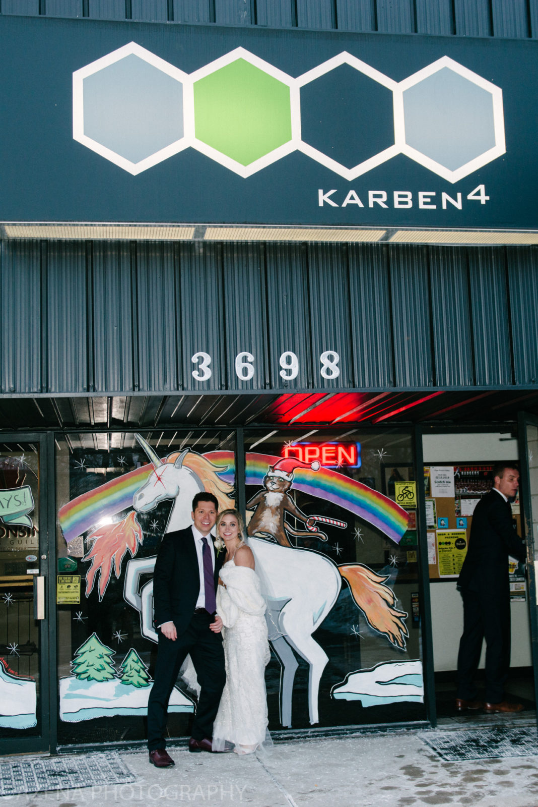 Bride and Groom in front of unicorn at Karben 4 Brewing
