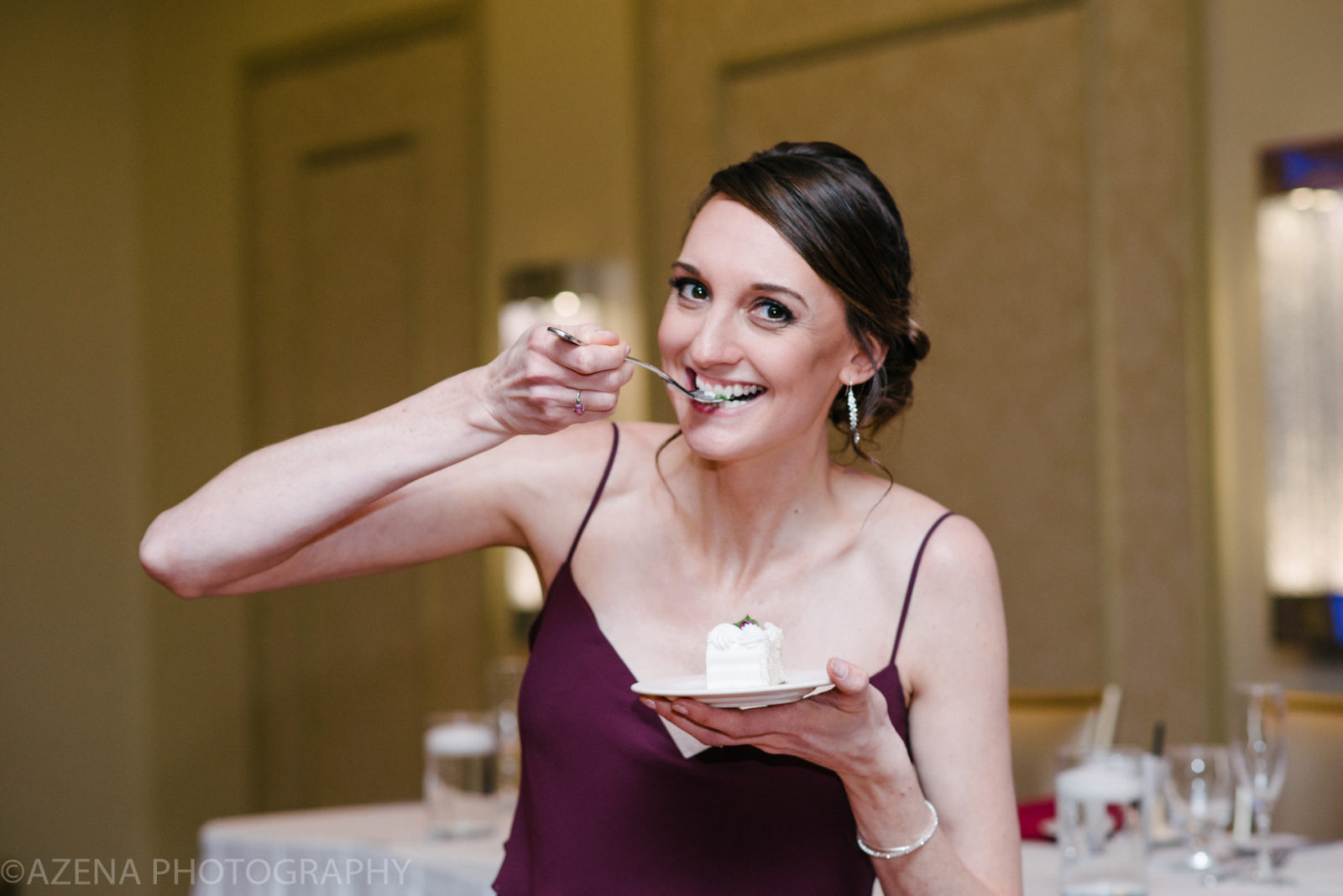 Bridesmaid eating cake