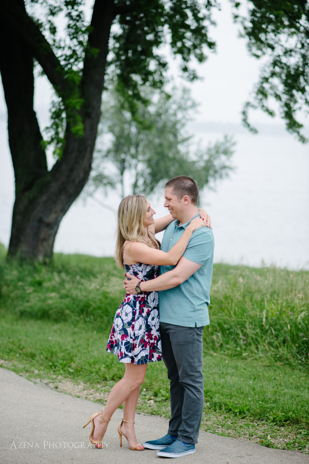Taking a walk by Lake Monona for engagement session