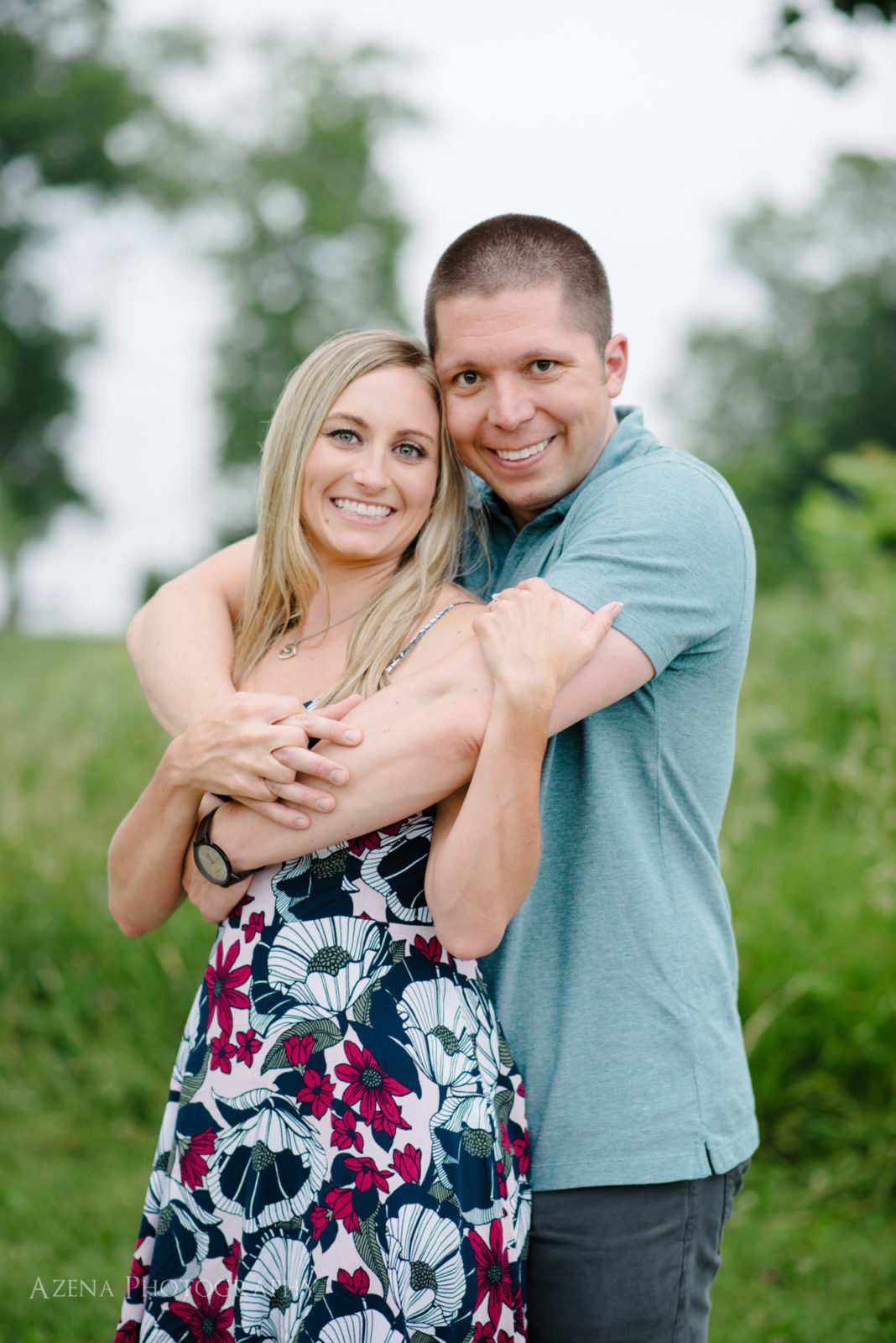 Adorable hug and pose during engagement session at Olin Park in Madison, WI