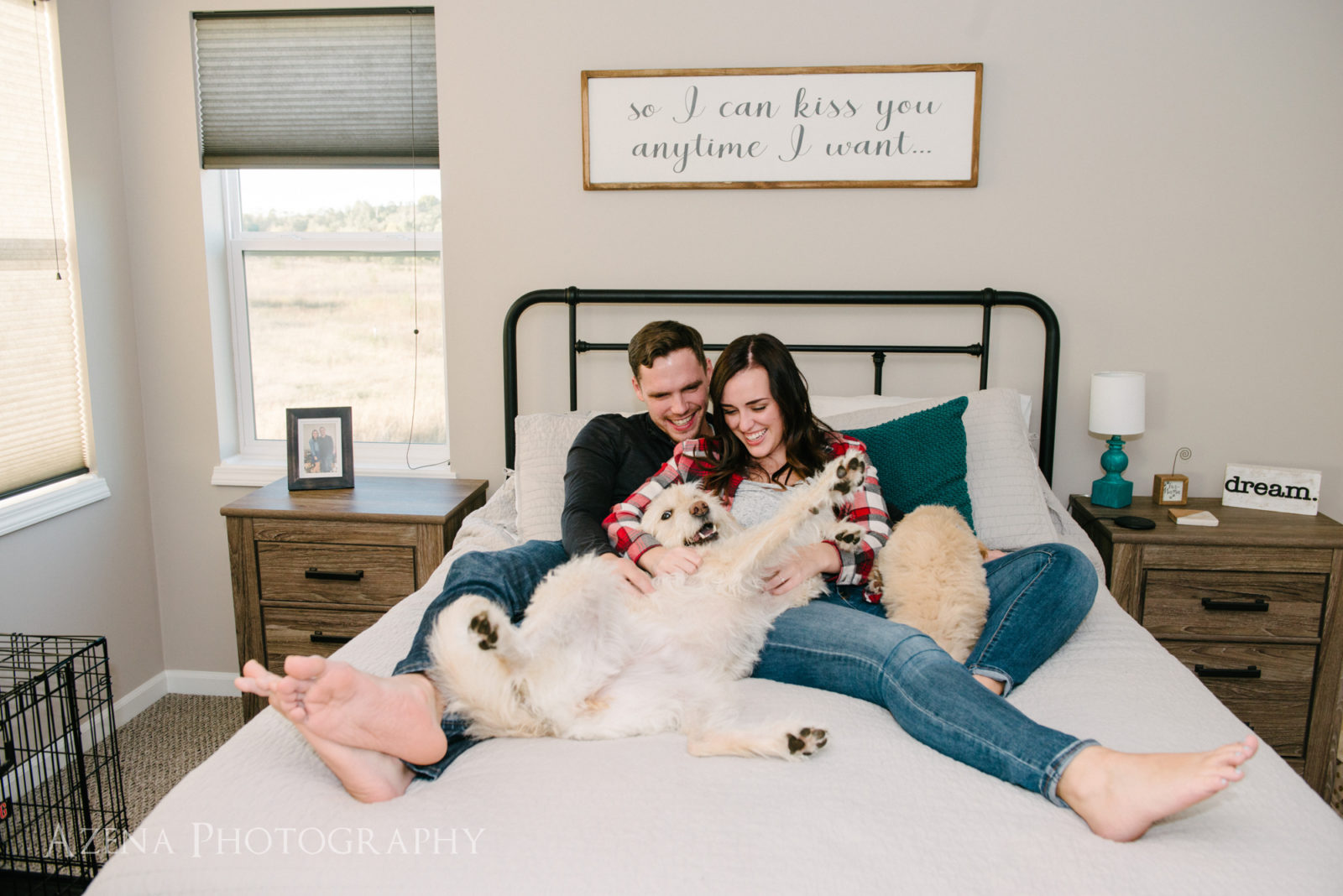 engagement session at home in bedroom with dogs