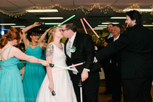 Bride and Groom grand march with light sabers