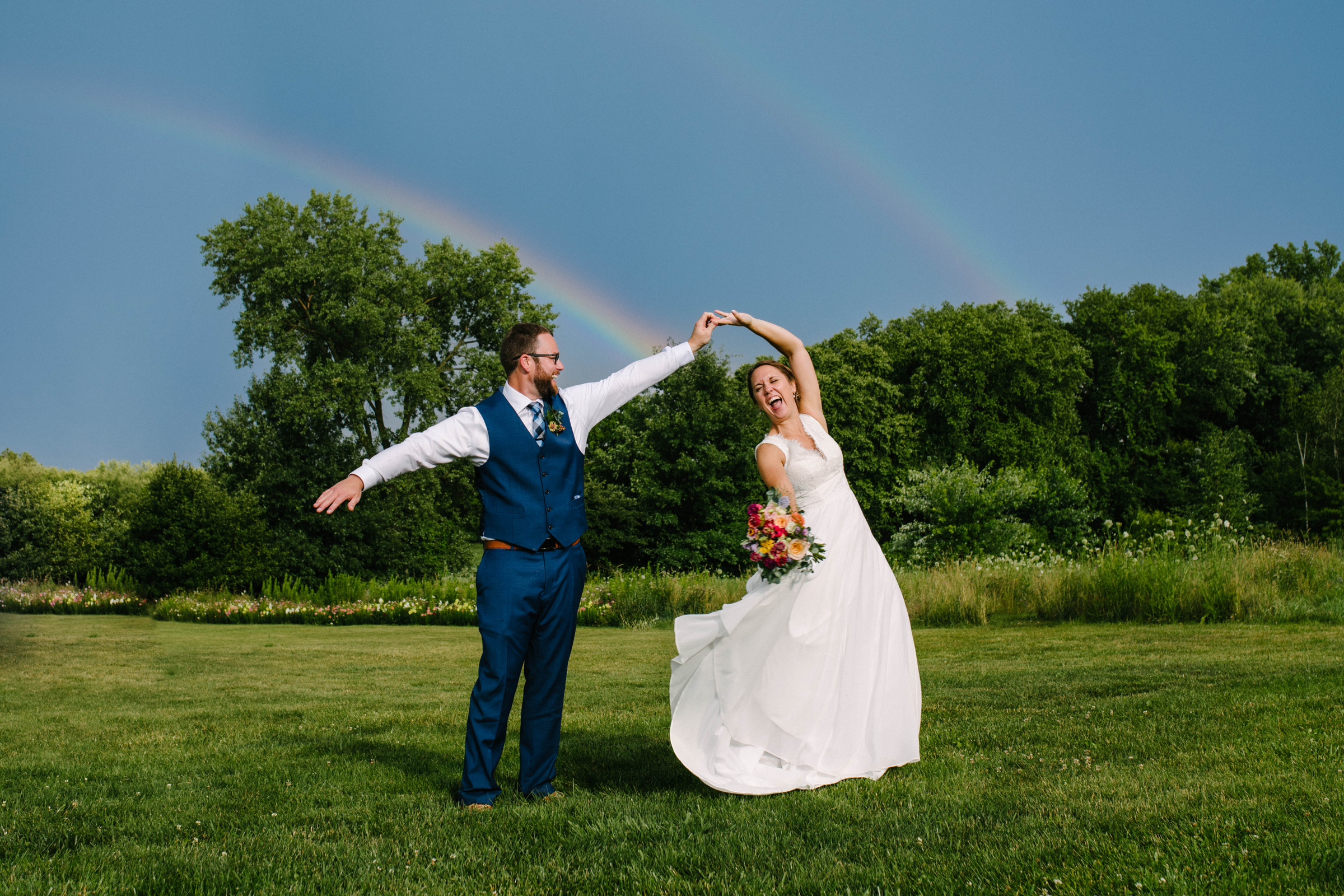 Wedding Day Timeline Intro Photo with double rainbow